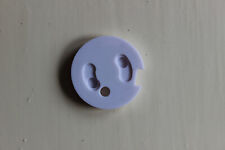 Cache-prises bébé -