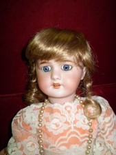 Q1.PERRUQUE pour POUPEE ANCIENNE PORCELAINE .BLOND VENITIEN . TOUR DE TETE 31 CM