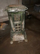 Ancien poêle charbon - à,