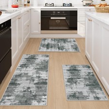 Lot kitchen mats in front - of, 3