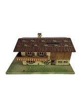 Ancien jouet tirelire tôle