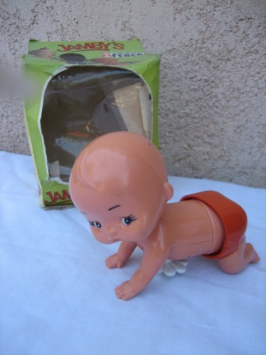 Ancien jouet mécanique - , bébé