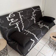 canapé clic clac état neuf pour cause de déménagement de couleur noire 