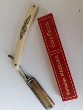 Rasoir à main ivoirine lame forgée sculptée lame de 14cms fermée 