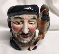 ANCIENNE CHOPE OU PICHET FAIENCE  BARBOTINE TÊTE HOMME ANSE FORME DE CANARD 13CM