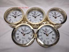 Lot de 5 horloges murales en
