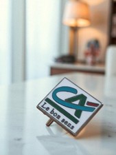 Pin's publicitaire vintage en