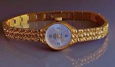 Superbe montre Maty  Besançon montre bracelet plaqué or 18carats bijou