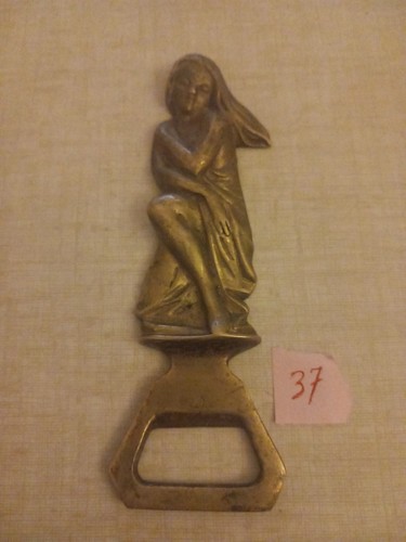 Décapsuleur femme bronze - en,