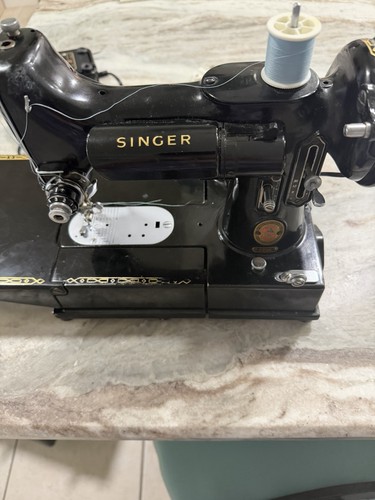 Singer featherweight open arm - open,