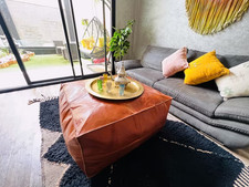 Repose-pieds vintage en cuir