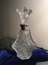 très beau flacon en cristal taillé monté argent ancien