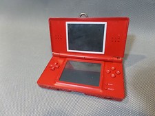 NINTENDO DS LITE ROUGE  en l'état prise de chargeur à revoir fait pas contact