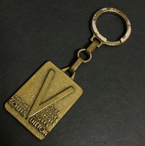 Louis vuitton malletier - vuitton, gold
