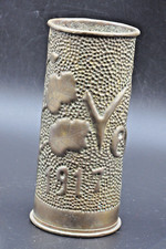 Ancien obus sculpté décoré