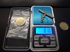 clef de montre et sa chainette en or poincon tete d'aigle,P 8,10g au total