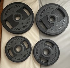 poids musculation 2 x 10kg Et 5kg Disques