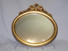 Miroir ovale dans son cadre