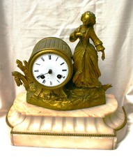 Belle pendule ancienne PH Mourey en régule doré et marbre