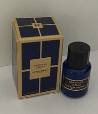 miniature de parfum  Carolina Herrera eau de parfum  5 ml pleine + Boîte