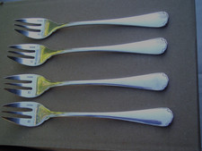 Christophe 4 fourchettes a huitres de la maison CHRISTOFLE modele Versailles