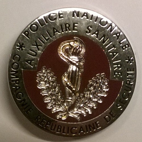 Auxiliaire sanitaire insigne