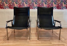 PAIRE DE FAUTEUILS RELAX CUIR NOIR ET CHROME DESIGN " HANS EICHENBERGER" 1960.