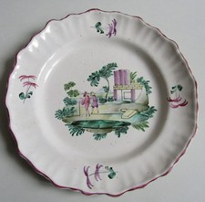 Varages. Assiette en faïence décor de personnages dans un paysage, XVIIIe siècle