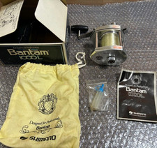 Moulinet de pêche Shimano Bantam 1000L Baitcast JDM poignée droite vintage...