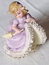 petite fille en céramique