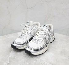 CHANEL Baskets Chassix logo CC