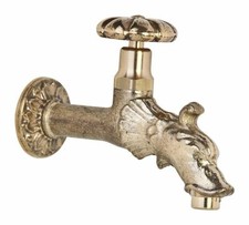 Robinet antique tête de