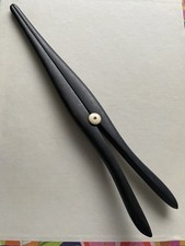 Ancienne pince à gants bois