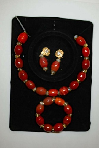 Red african cultural bead with - african,