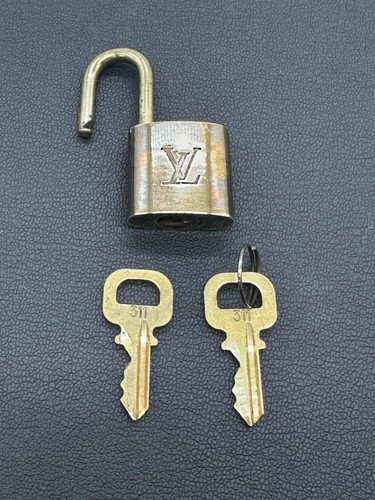 Cadenas louis vuitton doré - louis,