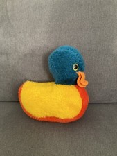 Canard en peluche jaune orange