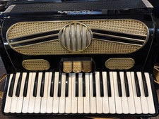Black Gold Hohner Piano