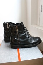 Prada bottines en cuir noir