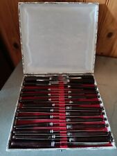 Coffret 24 couteaux table inox manche en Bakélite