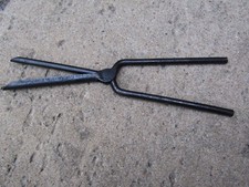 outil ancien de coiffeur fer a