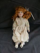 Poupée porcelaine de