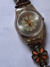 Montre de femme SWATCH  SWISS MADE en bon état de fonctionnement. Comme neuve