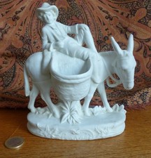 Petit biscuit, l'ânier et son âne, fabrication allemande, état impeccable