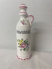 Bouteille à eau de vie framboise en porcelaine faïence barbotine France lunevil?