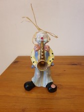 Figurine clown musicien