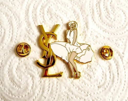 Pin logo ysl yves - pin’s,