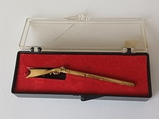 Pince à cravate ancienne en