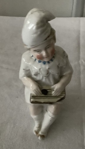 Ancienne figurine enfant sur