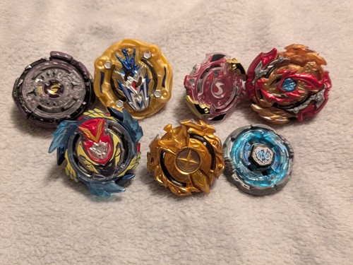 Beyblades and accessories - 7,