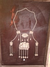 Colliers, épingles et boucles